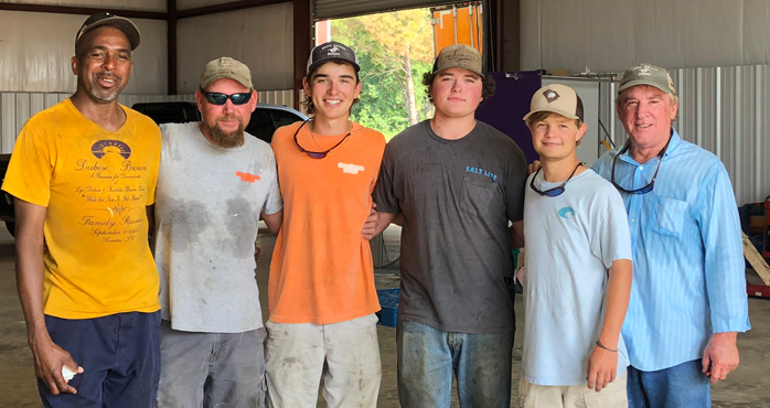 Image of crew and owner